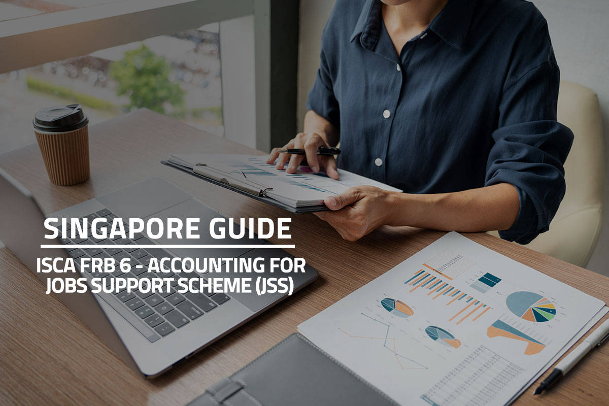 words singapore guide isca frb6 - accounting for jobs support scheme against background of a business man working with graph data in laptop and documents on his desk at office