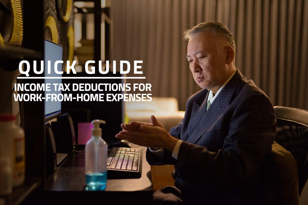 words quick guide income tax deductions for work-from-home expenses against background of asian businessman working with a computer at home